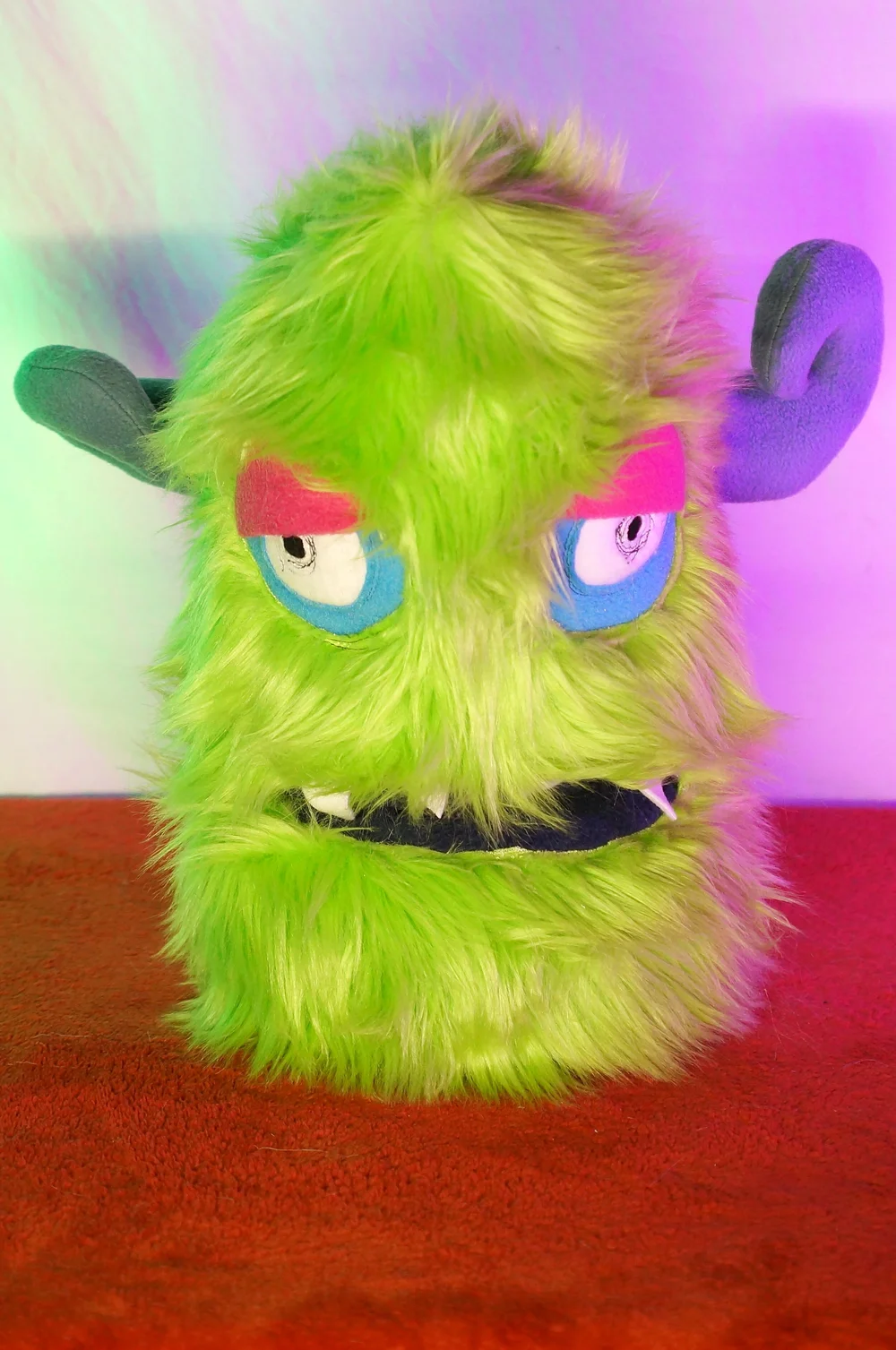 LARGE GREEN TWO EYED MONSTER WITH HORNS & POCKET MOUTH — TIM